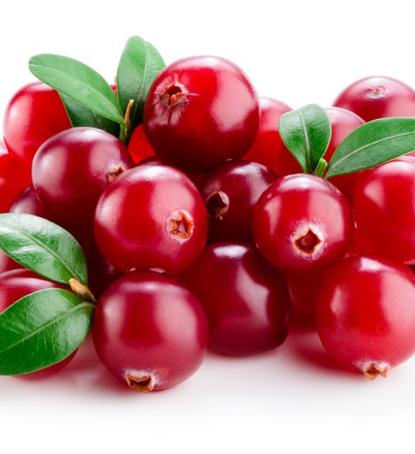 Cranberry with leaves isolated on white.