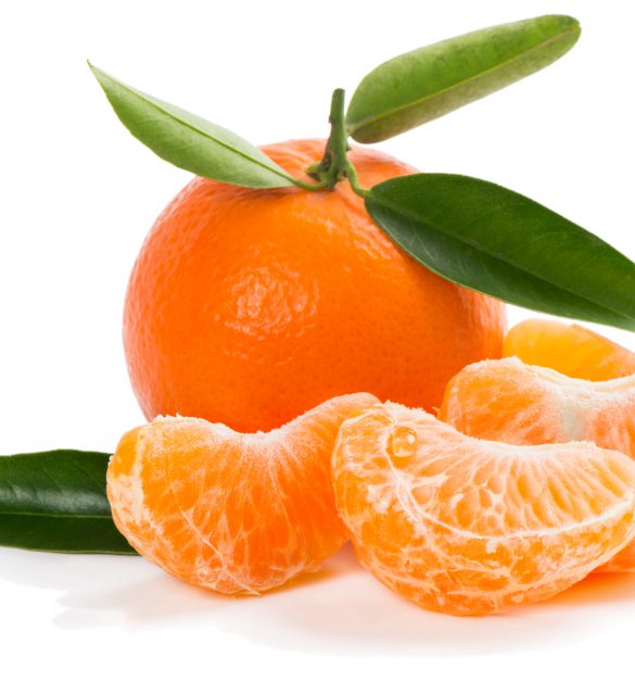 unpeeled tangerine with green leaves and slices tangerine with leaves and slices isolated on white
