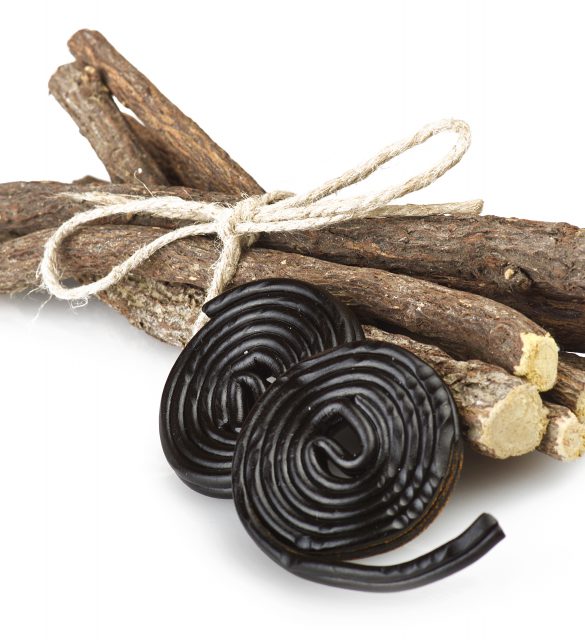 Licorice roots and licorice black on the white Licorice roots and licorice black on the white
