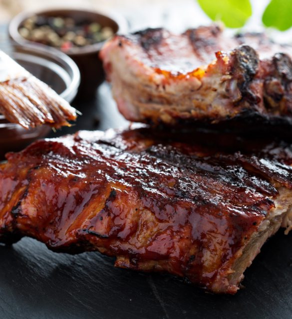 Grilled pork baby ribs with bbq sauce Grilled pork baby ribs with barbecue sauce