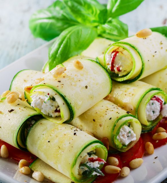 zucchini rolls with feta cheese and pine nuts