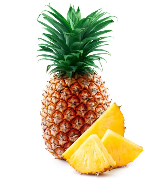 pineapple with slices isolated on white