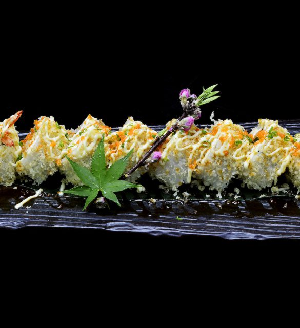 ebi tempura maki. Japanese sushi shrimp tempura roll on black isolated background. Japanese tradition fusion food style. ebi tempura maki. Japanese sushi shrimp tempura roll on black isolated background. Japanese tradition fusion food style.