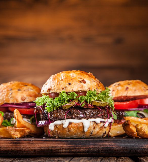 Close-up of home made burgers Close-up of home made burgers on wooden background