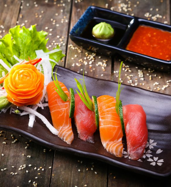 Japanese Salmon, tuna sushi and sauce closeup Japanese Salmon, tuna sushi and sauce - decor, stylish food