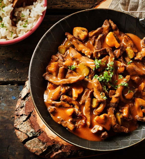 Overhead view of a pan full of zurich ragout. Meat cut into strips, a german menu of tradition cuisine.